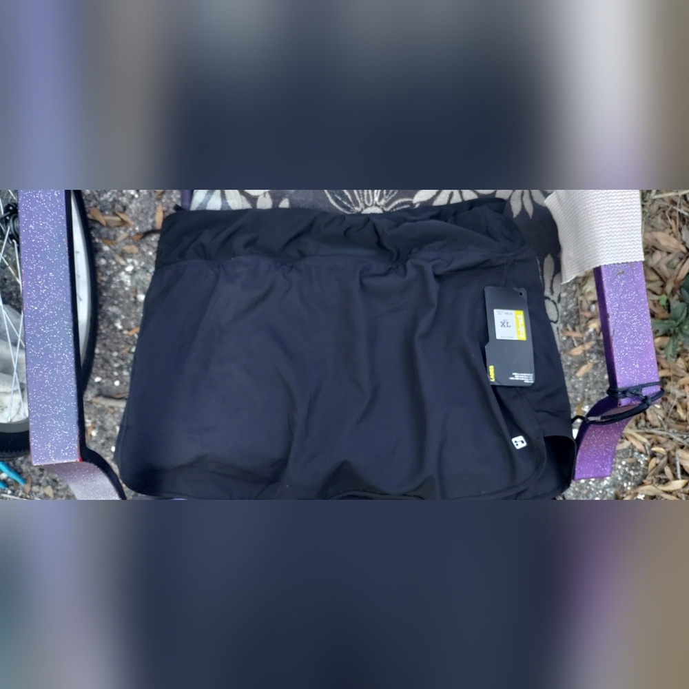 Black Athletic Skorts with center back pocket, by "hind". Black, NWT.